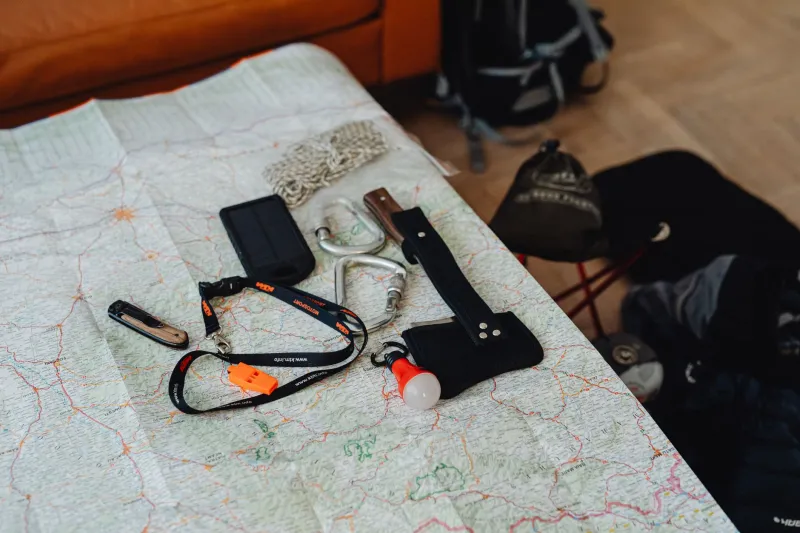 The Weight of the Pack: Designing Resource Systems That Pressure Without Paralyzing